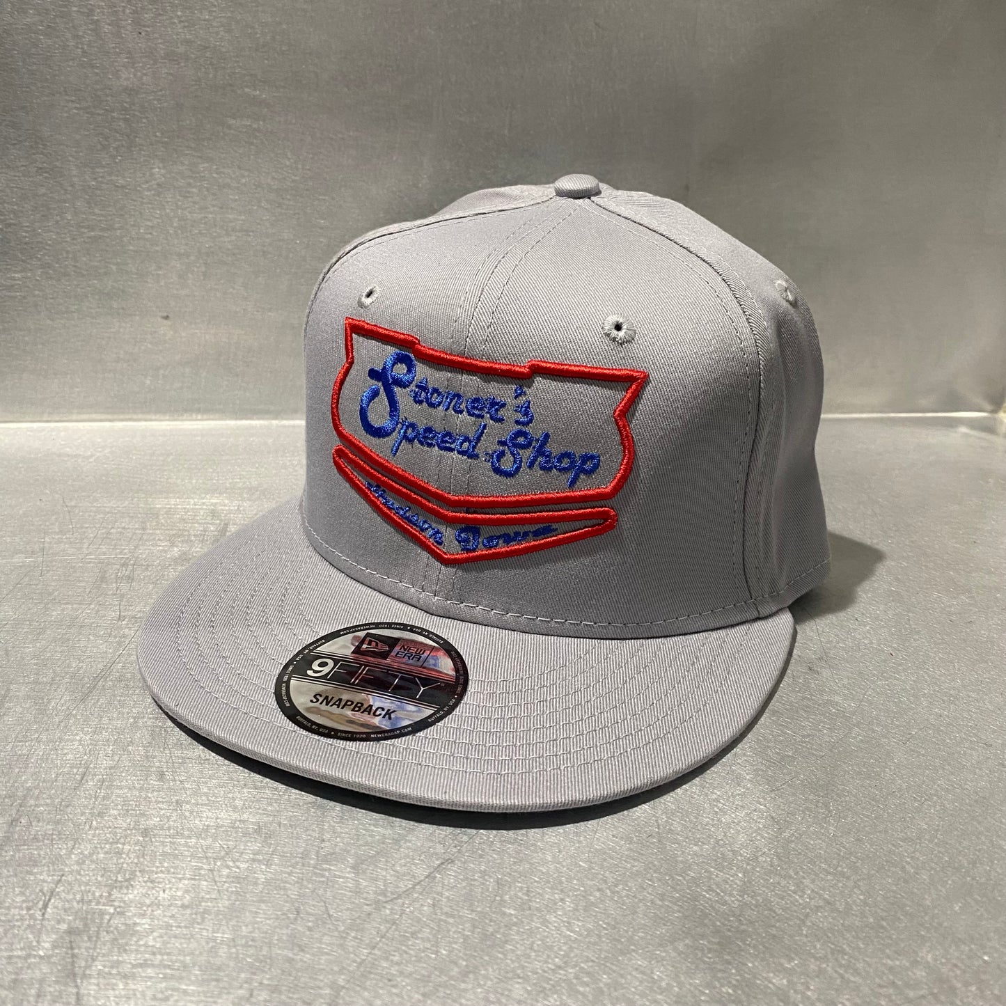 New Era 9FIFTY Light Grey Snapback Red/Blue Puff Shield Logo