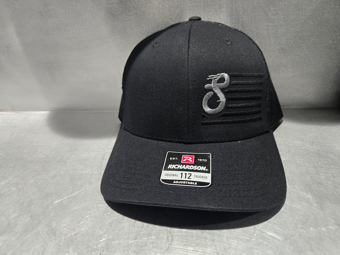 Richardson 112 Black with Gray S Flag Logo